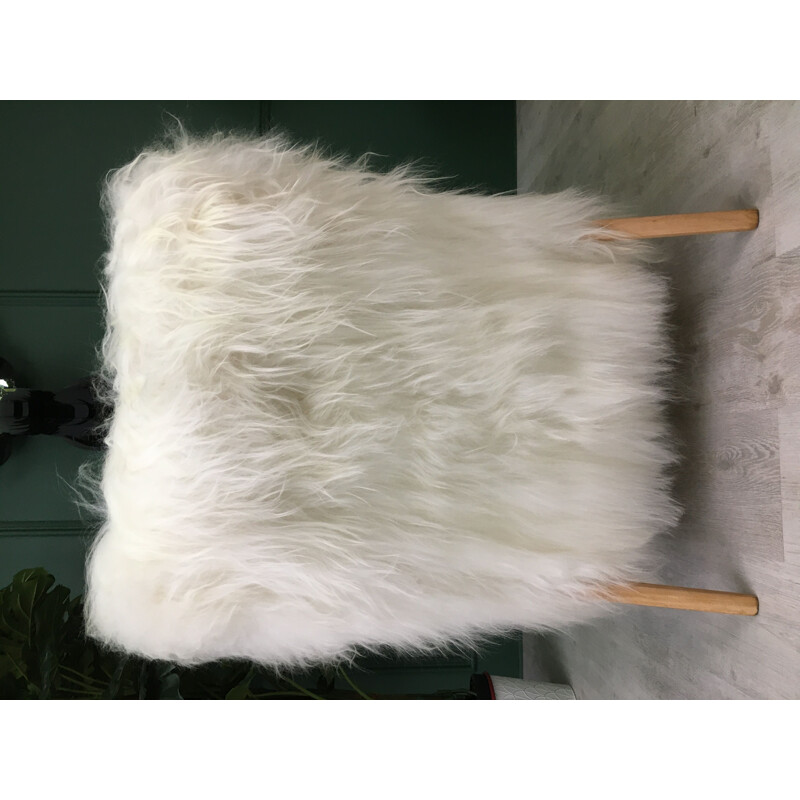 Vintage white sheepskin armchair