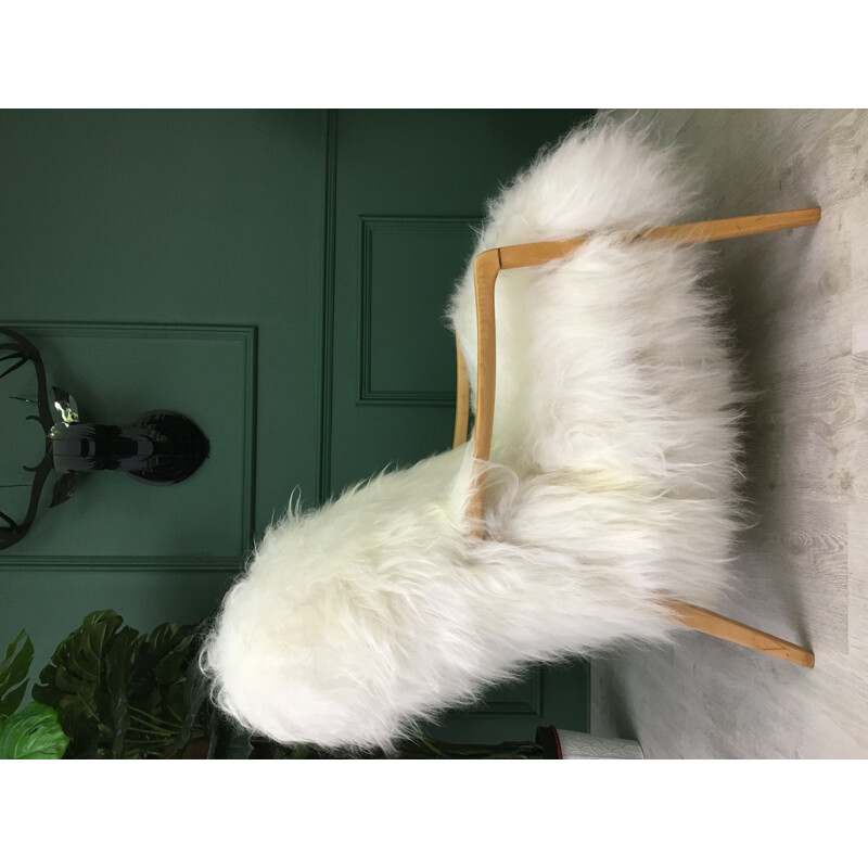 Vintage white sheepskin armchair