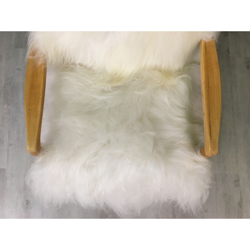 Vintage white sheepskin armchair
