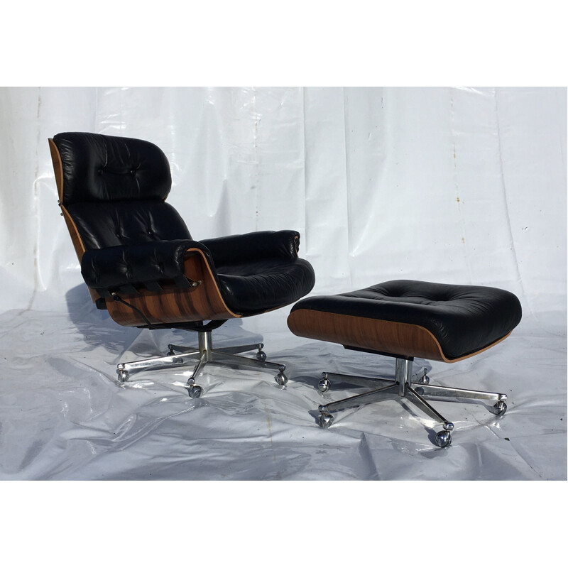 Vintage leather and rosewood armchair and ottoman by Martin Stoll