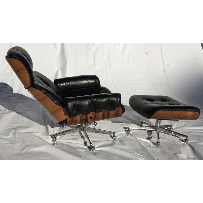 Vintage leather and rosewood armchair and ottoman by Martin Stoll