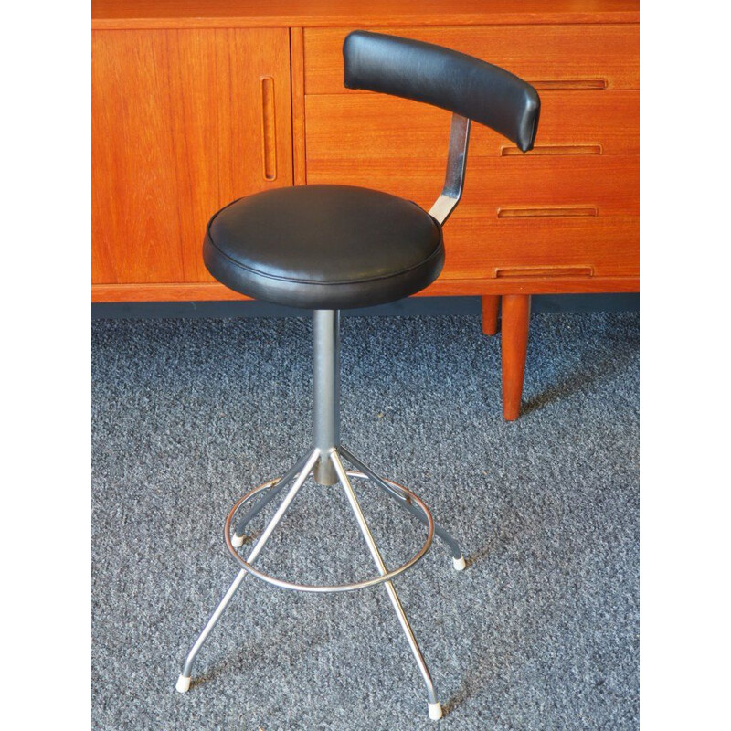 Vintage industrial factory stool in padded black vinyl