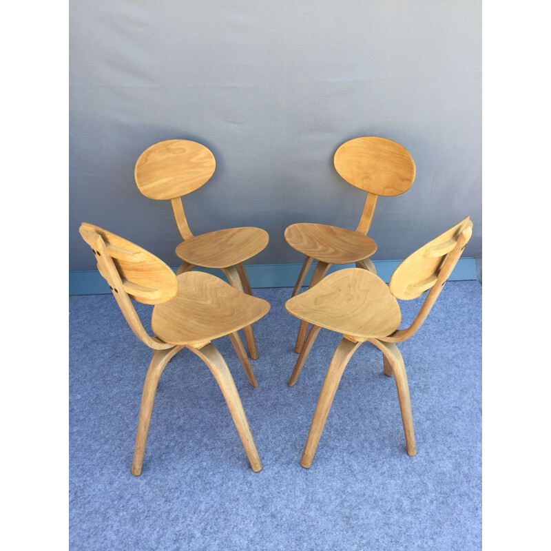 Suite of 4 ashwood chairs by Hugues STEINER 1950