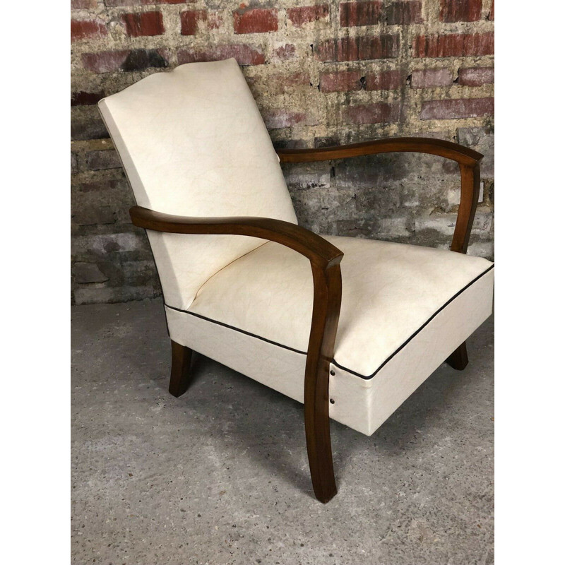 Vintage low armchair bridge style above beige leatherette ribbed grey 1940s