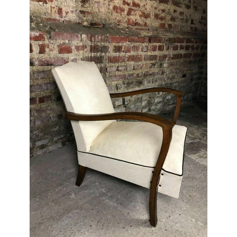 Vintage low armchair bridge style above beige leatherette ribbed grey 1940s