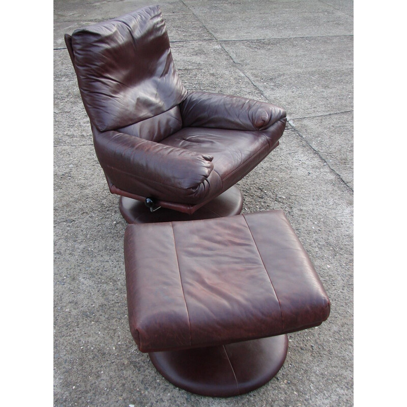 Vintage leather Rolf Benz armchair with footrest, 1970s