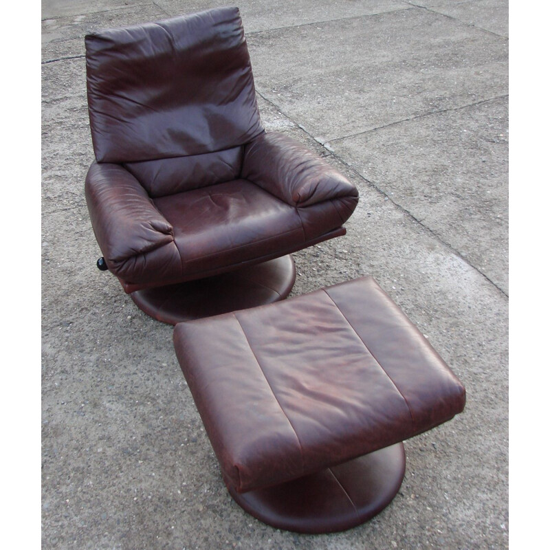 Vintage leather Rolf Benz armchair with footrest, 1970s