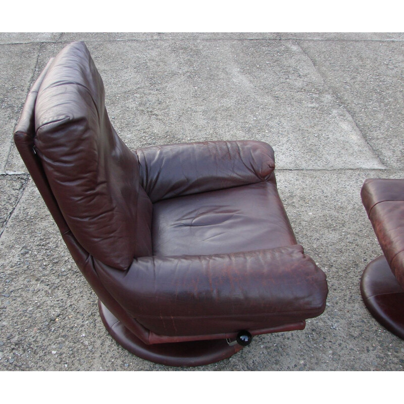 Vintage leather Rolf Benz armchair with footrest, 1970s