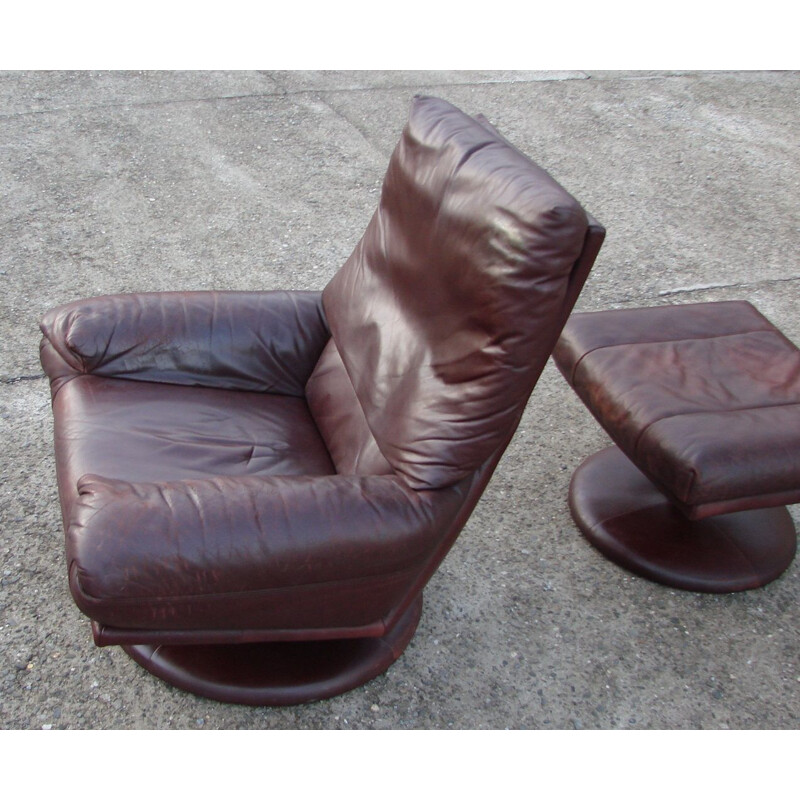 Vintage leather Rolf Benz armchair with footrest, 1970s