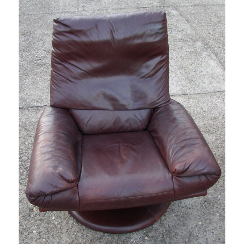 Vintage leather Rolf Benz armchair with footrest, 1970s