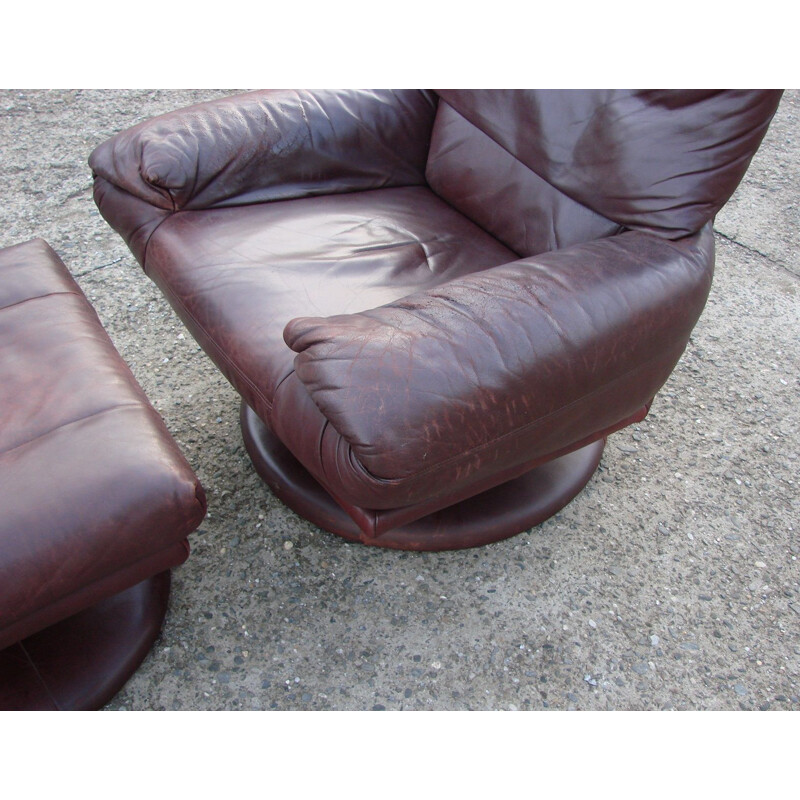 Vintage leather Rolf Benz armchair with footrest, 1970s