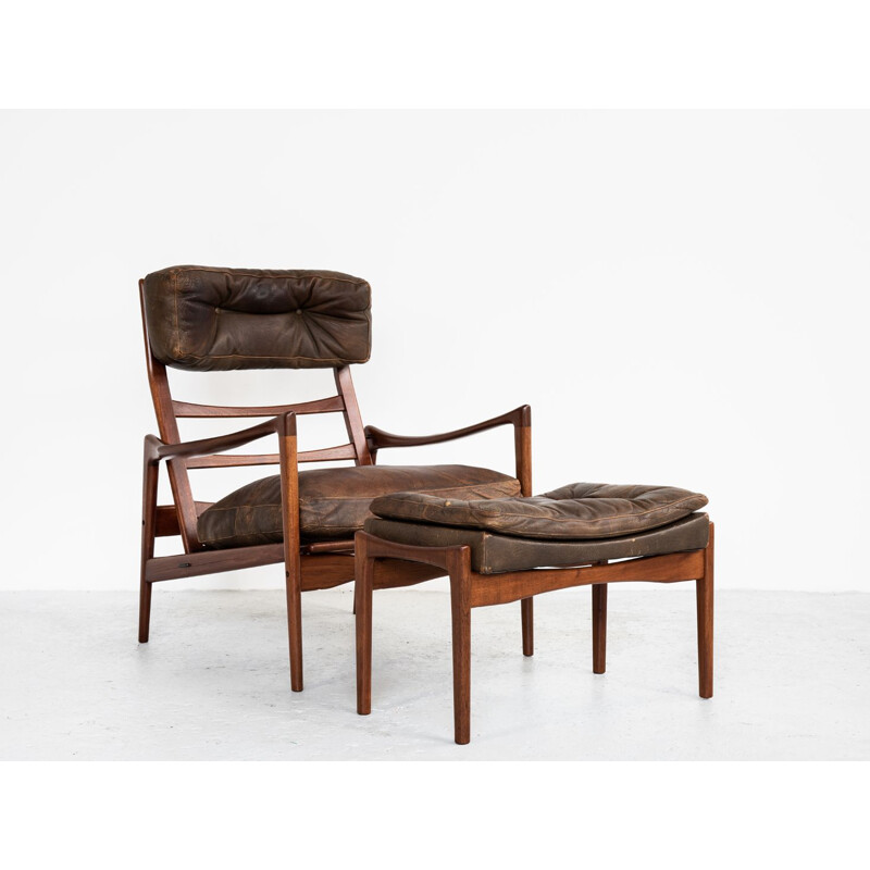 Vintage  easy chair and ottoman in teak and leather by Ib Kofod Larsen