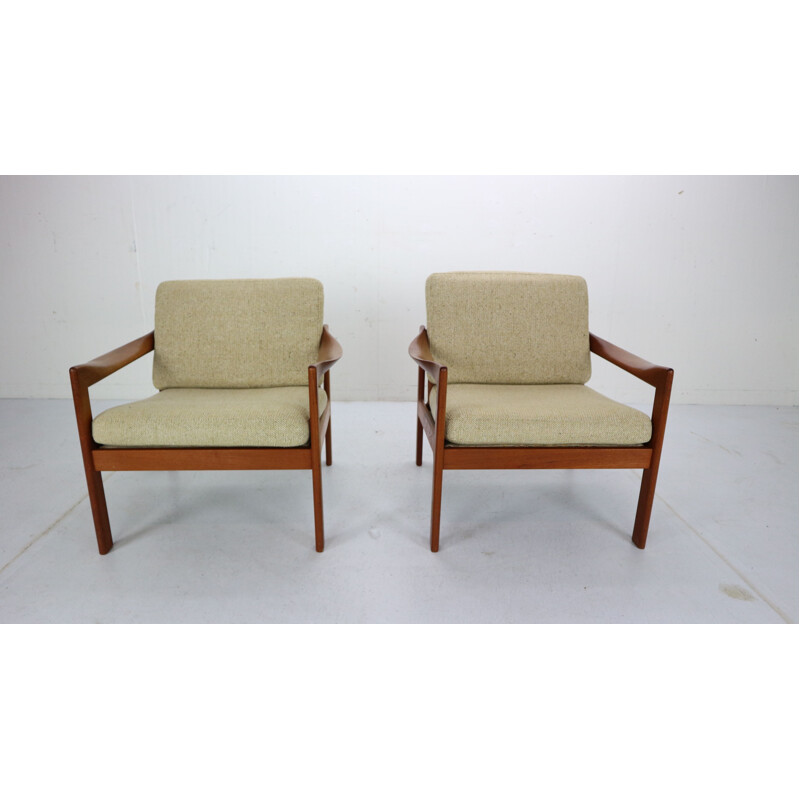 Pair of teak lounge chairs by Illum Wikkelsø for Niels Eilersen, Denmark, 1960 