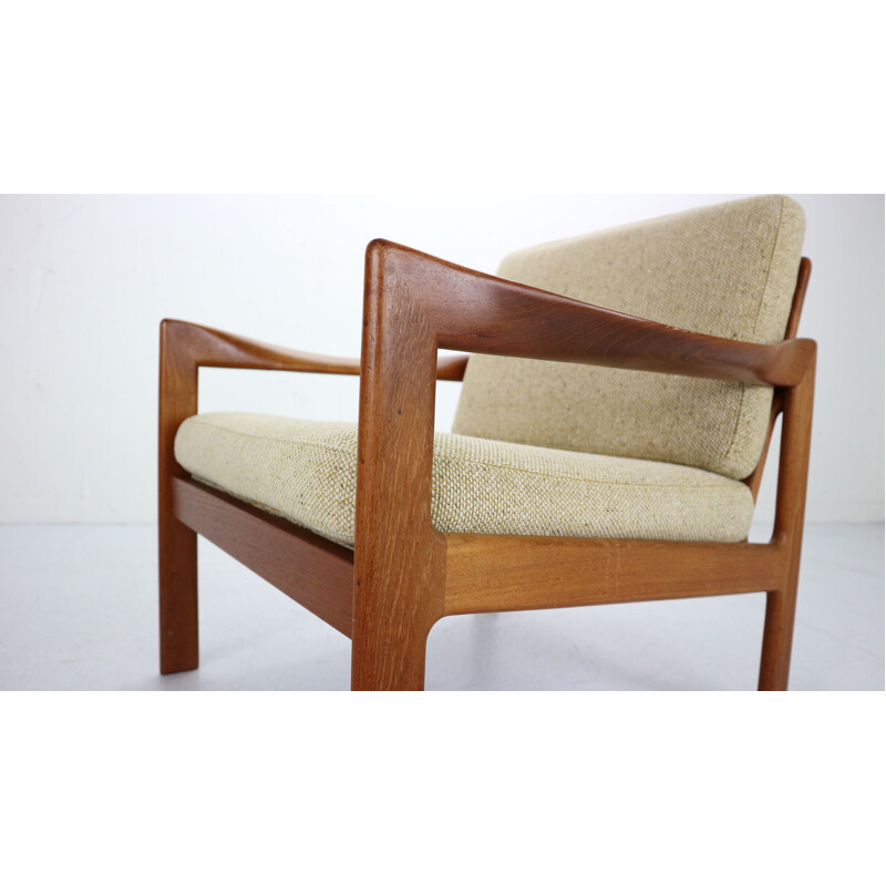 Pair of teak lounge chairs by Illum Wikkelsø for Niels Eilersen, Denmark, 1960 