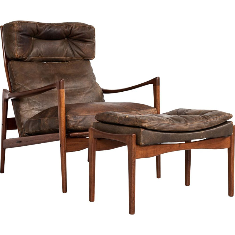 Vintage  easy chair and ottoman in teak and leather by Ib Kofod Larsen