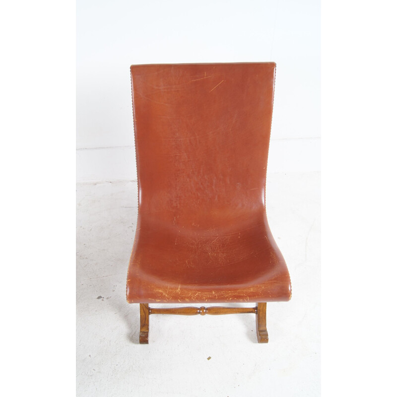 Vintage pair of low easychairs in cogac leather 