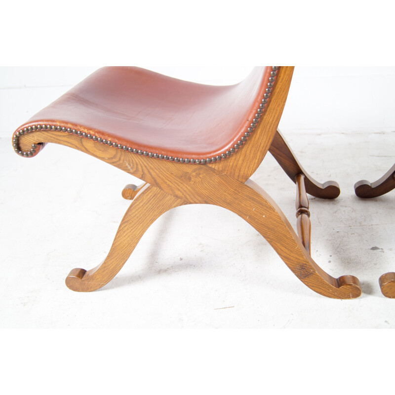 Vintage pair of low easychairs in cogac leather 