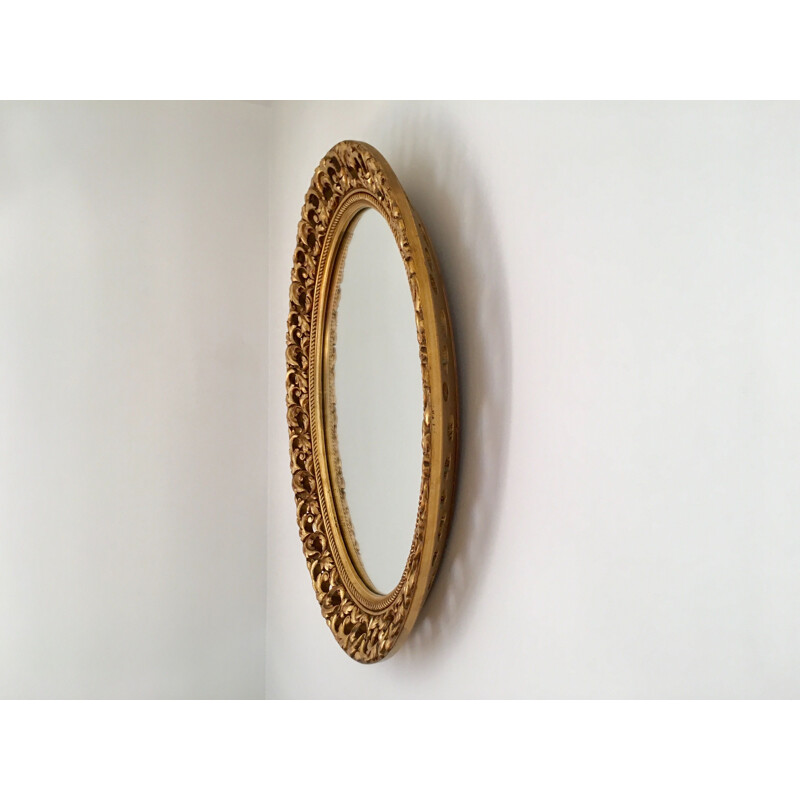 Miroir ovale vintage en bois doré