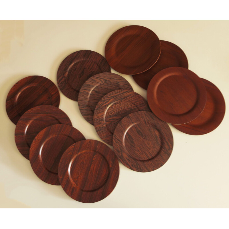 Danish vintage plates in teak and rosewood, 1960s