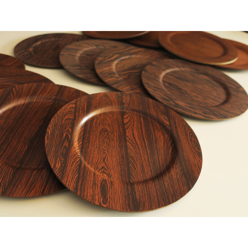 Danish vintage plates in teak and rosewood, 1960s