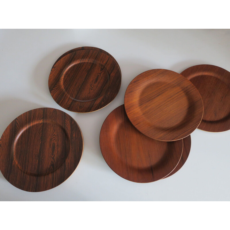 Danish vintage plates in teak and rosewood, 1960s