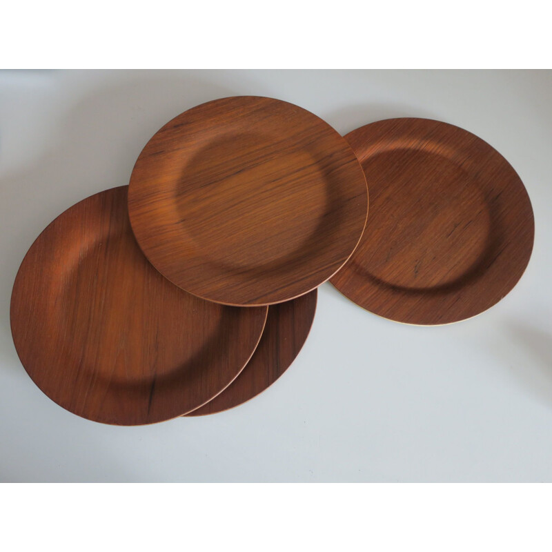 Danish vintage plates in teak and rosewood, 1960s