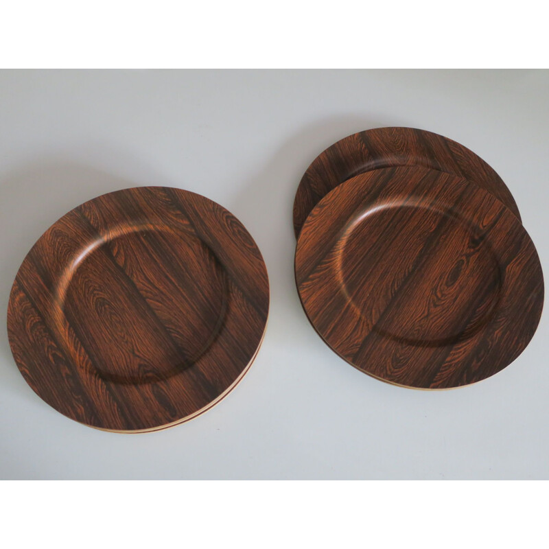 Danish vintage plates in teak and rosewood, 1960s