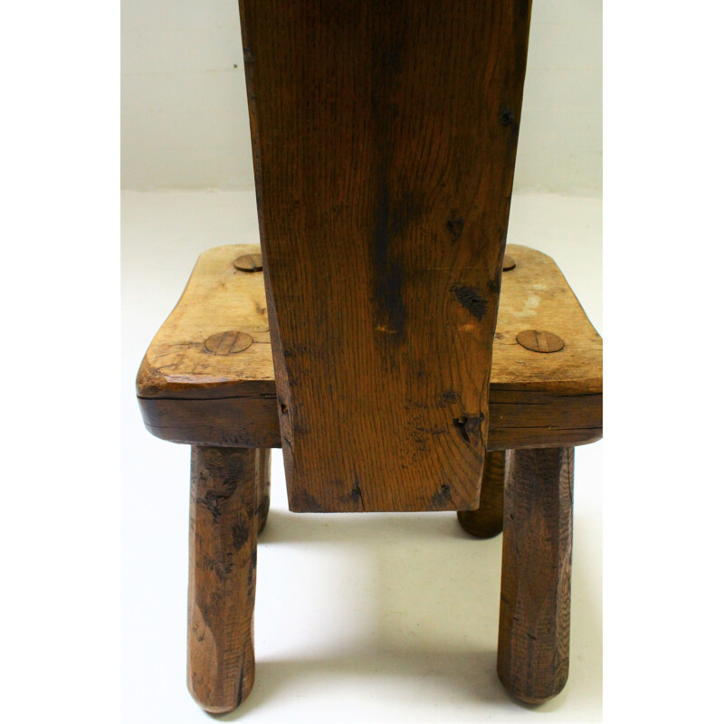 Brutalist vintage solid oak chair, 1950