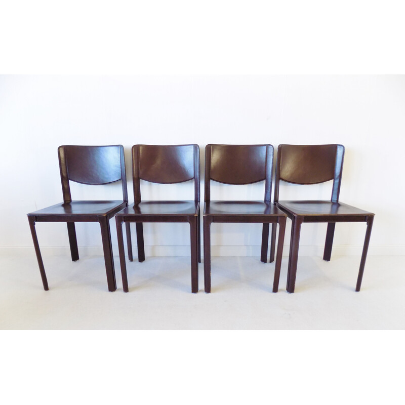 Set of 4 vintage leather dining chairs by Tito Agnoli