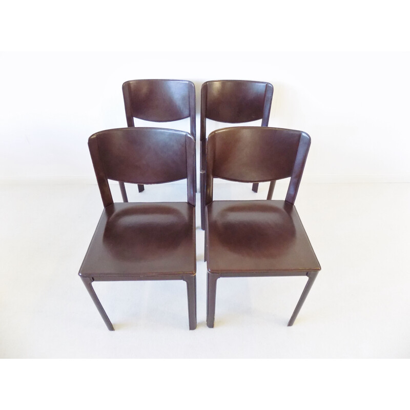 Set of 4 vintage leather dining chairs by Tito Agnoli