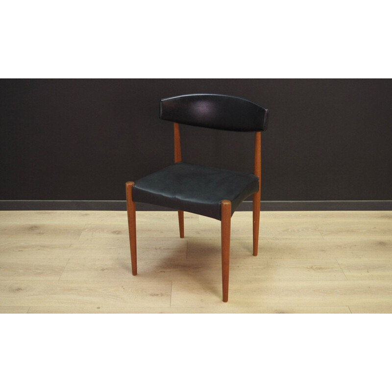 Vintage chair in black leather 1960