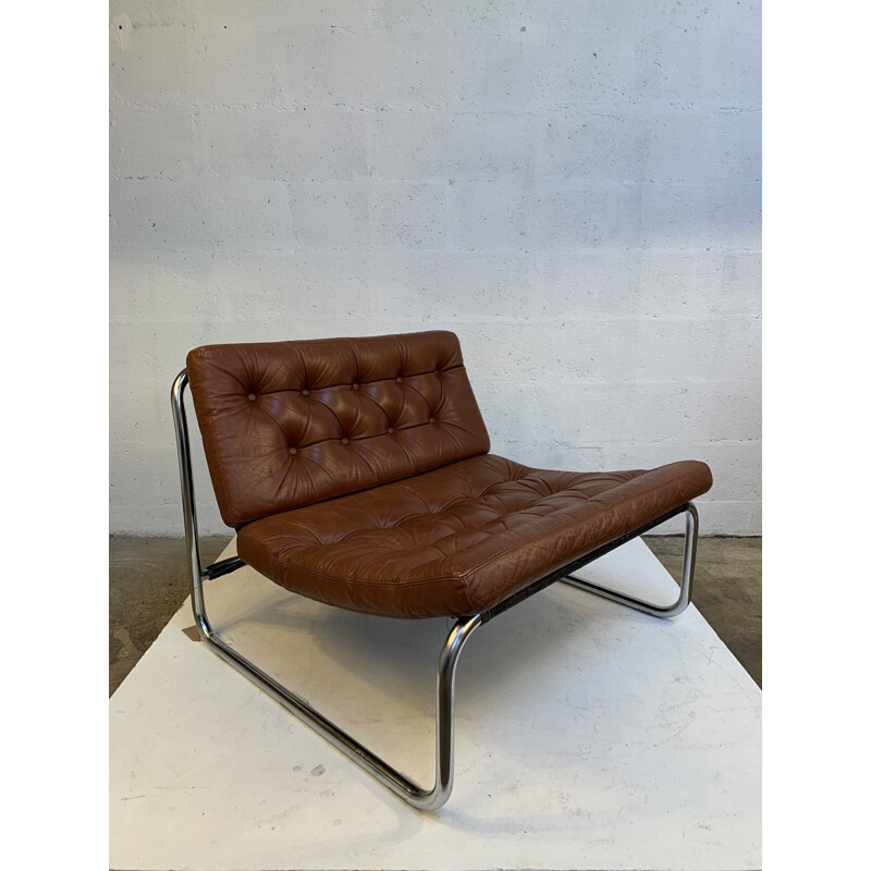 Pair of vintage leather armchairs