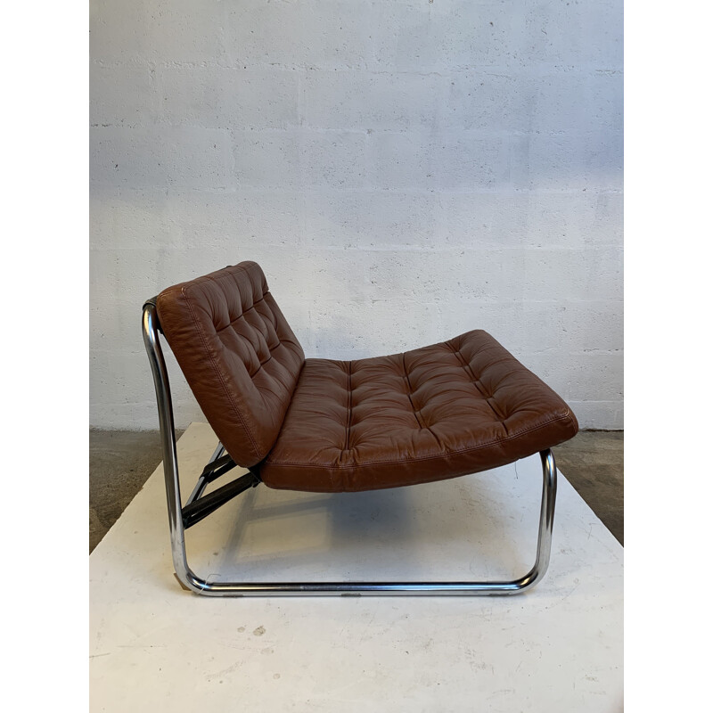 Pair of vintage leather armchairs