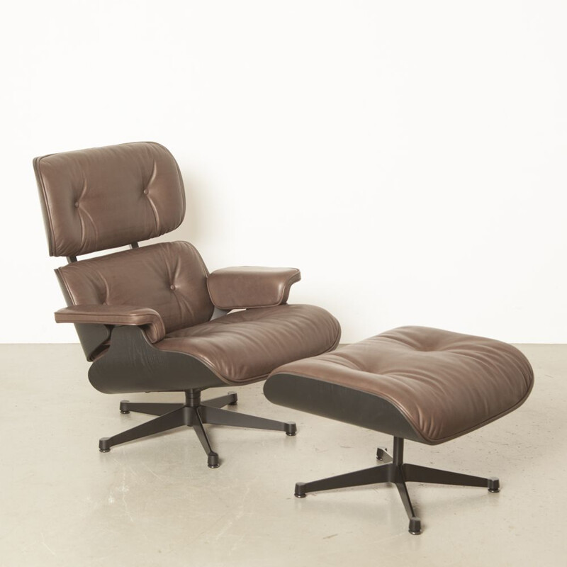 Vintage Lounge Chair and Ottoman by Charles & Ray Eames, made by Vitra in brown leather