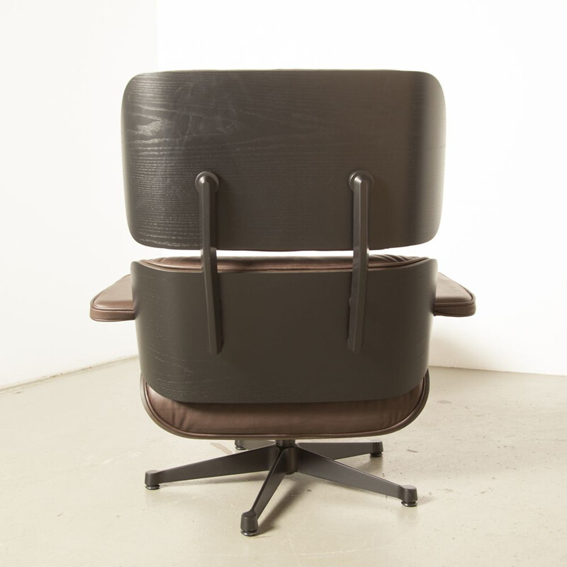 Vintage Lounge Chair and Ottoman by Charles & Ray Eames, made by Vitra in brown leather