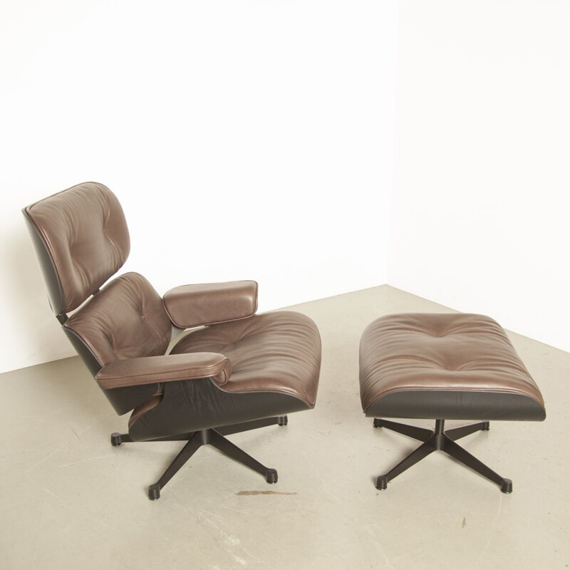 Vintage Lounge Chair and Ottoman by Charles & Ray Eames, made by Vitra in brown leather