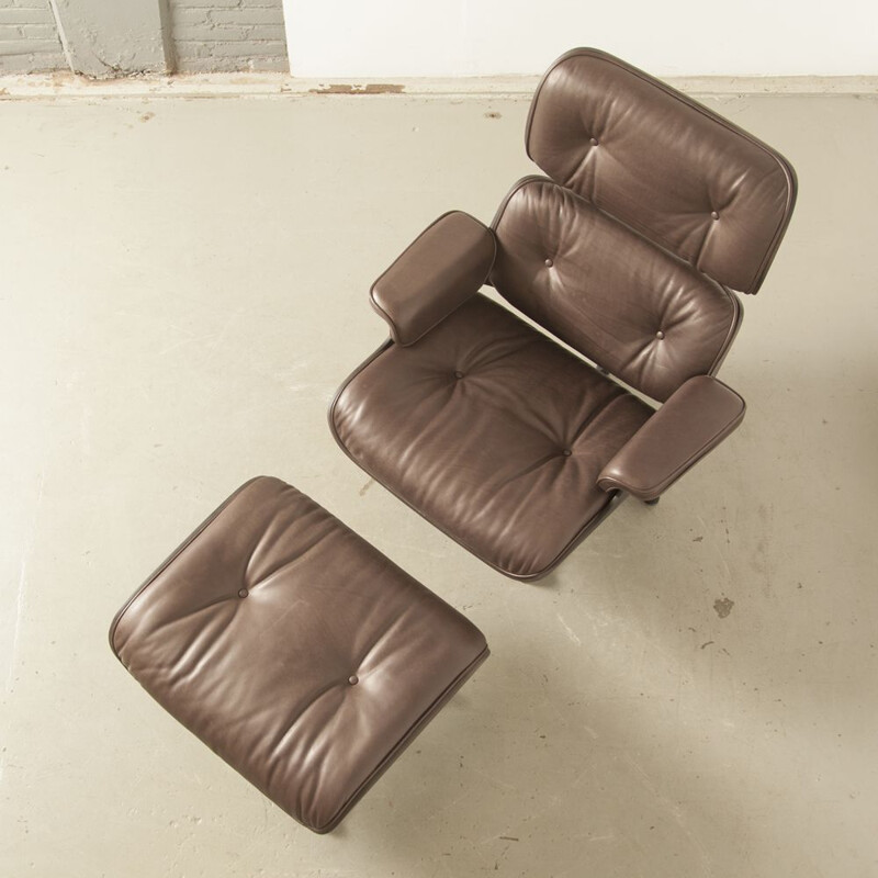 Vintage Lounge Chair and Ottoman by Charles & Ray Eames, made by Vitra in brown leather