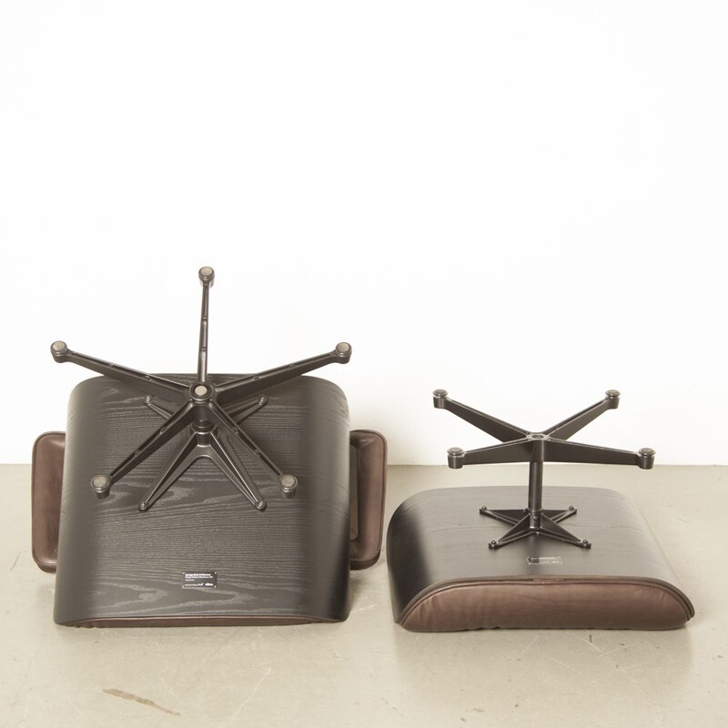 Vintage Lounge Chair and Ottoman by Charles & Ray Eames, made by Vitra in brown leather