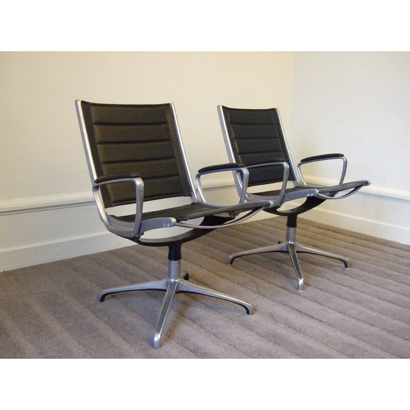 Set of two black swiveling desk chairs in leather and aluminium - 1960