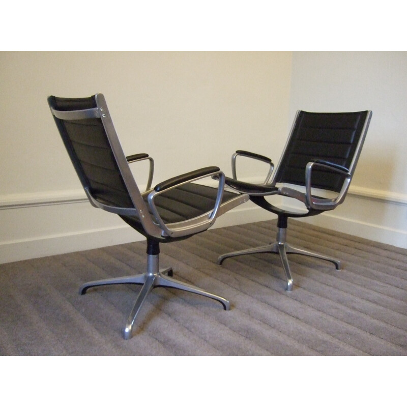 Set of two black swiveling desk chairs in leather and aluminium - 1960