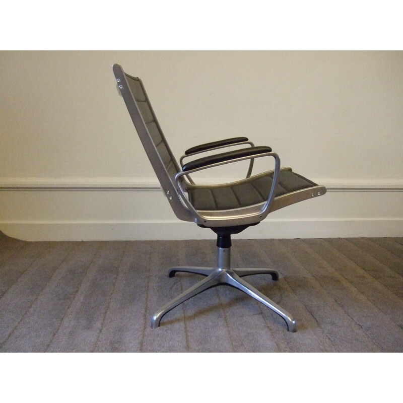 Set of two black swiveling desk chairs in leather and aluminium - 1960