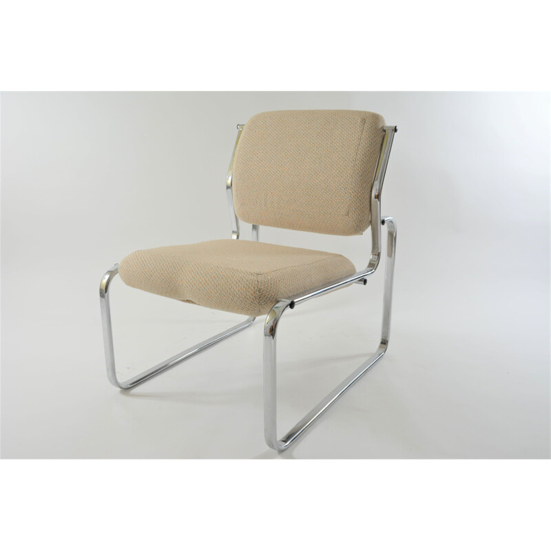 Vintage armchair in chrome and mottled fabric