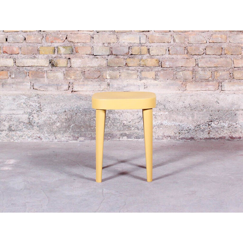 Vintage low stool in solid beech wood by Fischel 