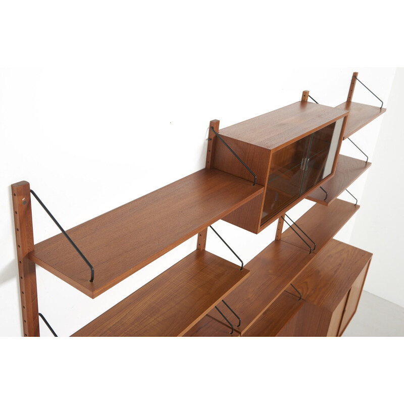 Vintage teak wall shelf by Poul Cadovius