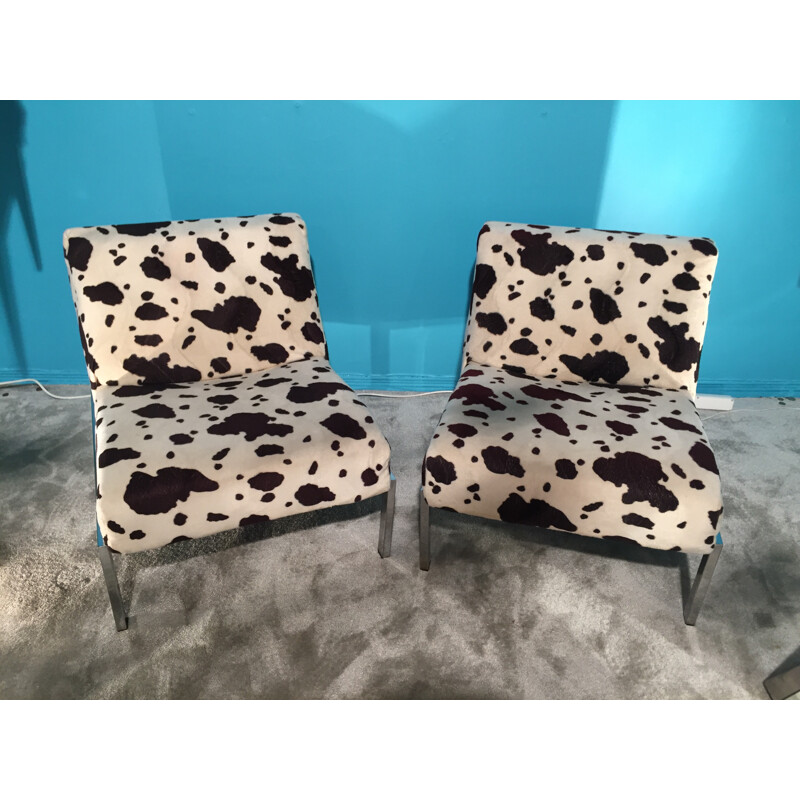 Pair of low chairs in cowhide patterned fabric - 1970s