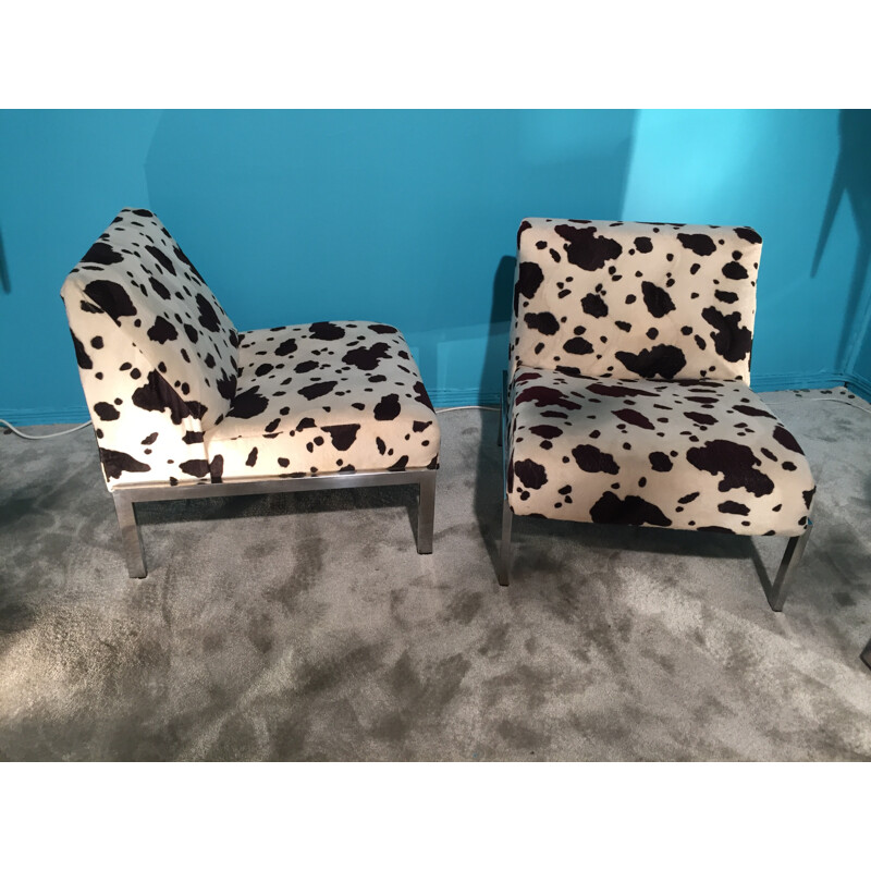 Pair of low chairs in cowhide patterned fabric - 1970s