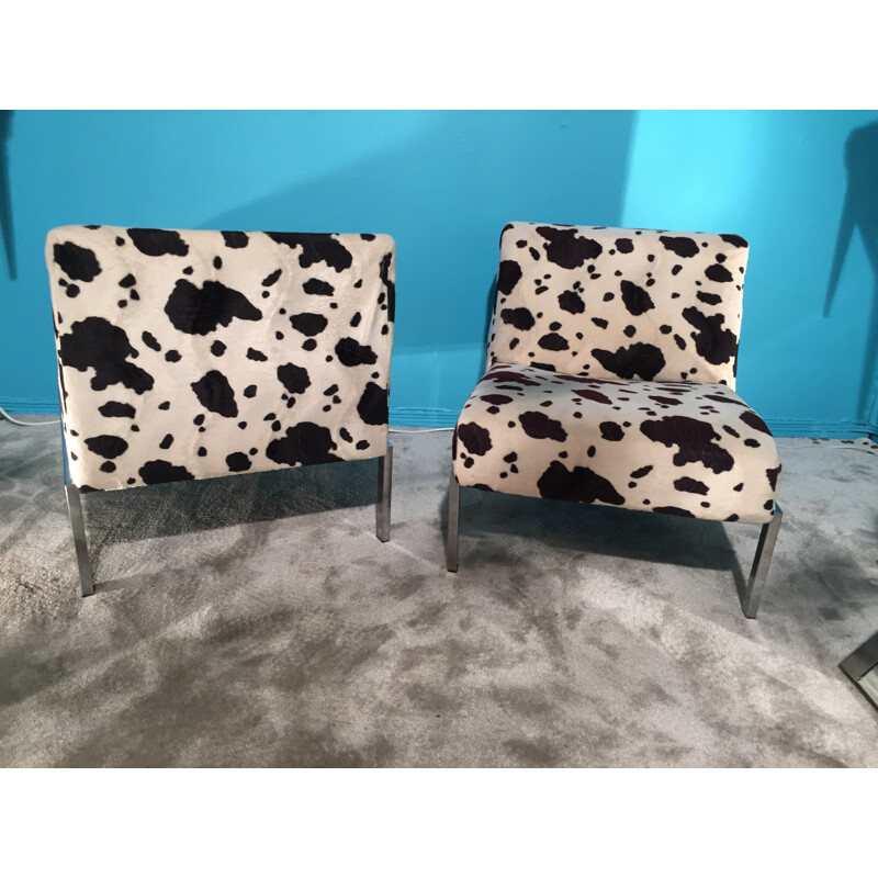 Pair of low chairs in cowhide patterned fabric - 1970s