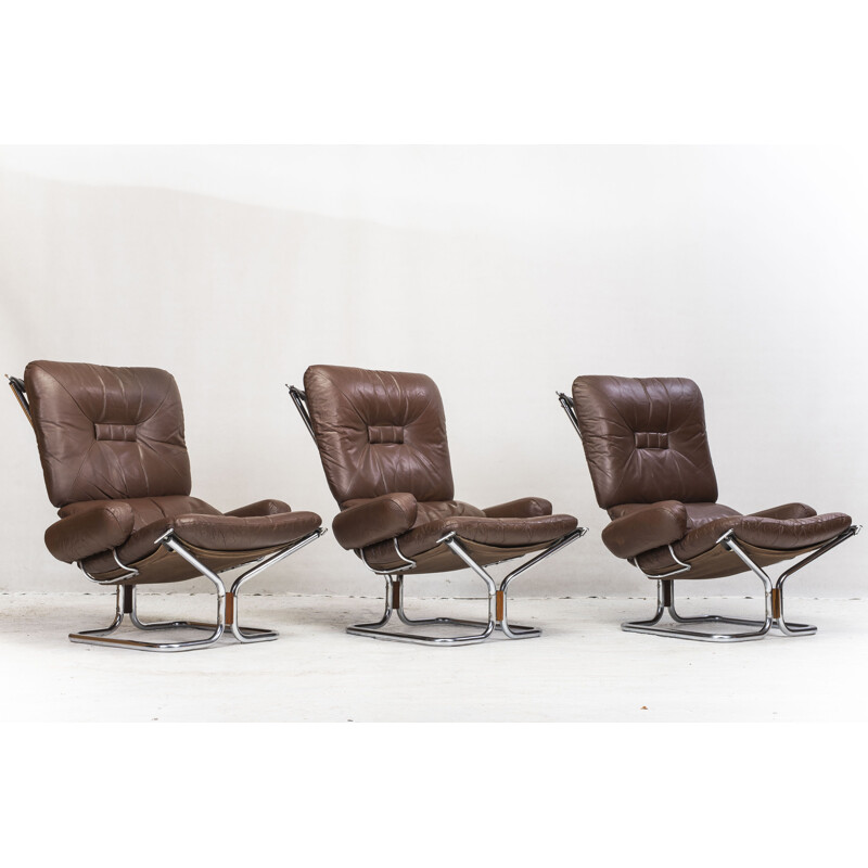 Set of 3 vintage Chrome and Leather armchairs and Ottoman by Ingmar Relling for Westnofa, 1960s