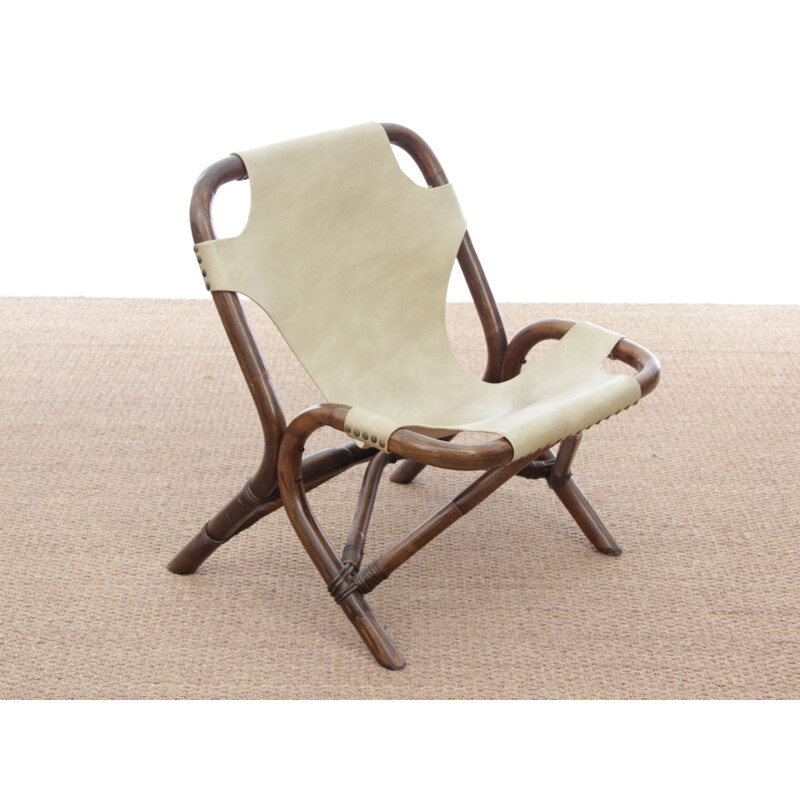 Paire de fauteuils vintage en rotin et simili cuir 