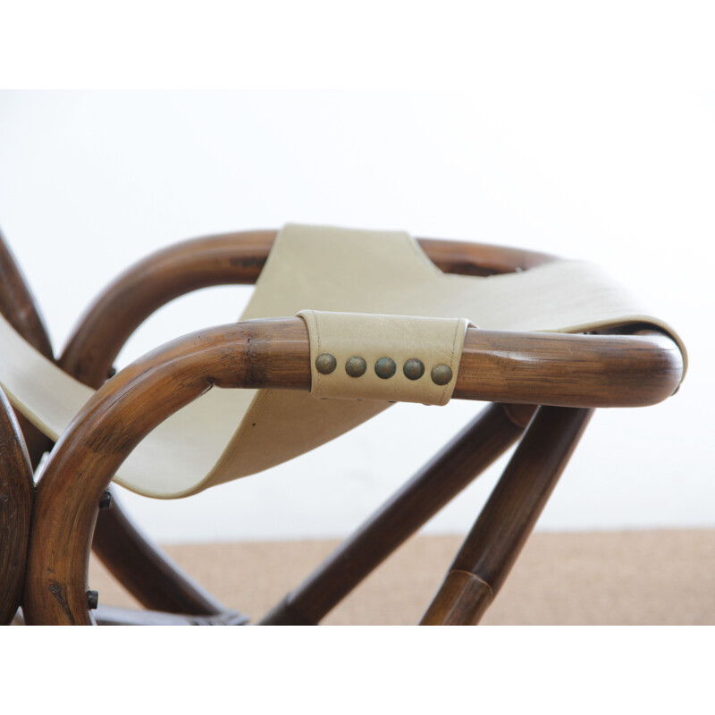 Pair of vintage rattan and imitation leather armchairs 